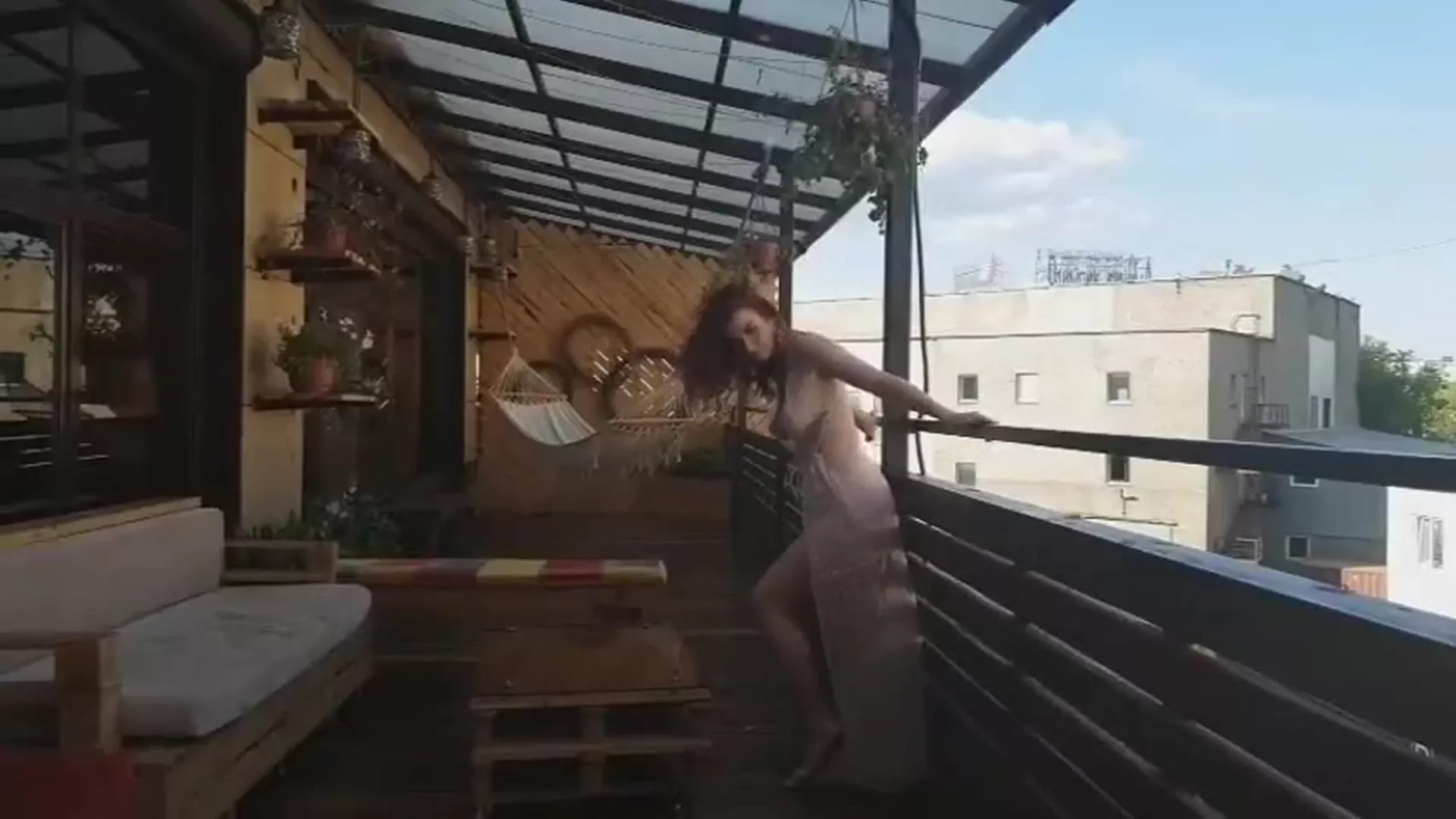 sexy onlyfans model Inga Lis taking exotic pictures in the balcony
