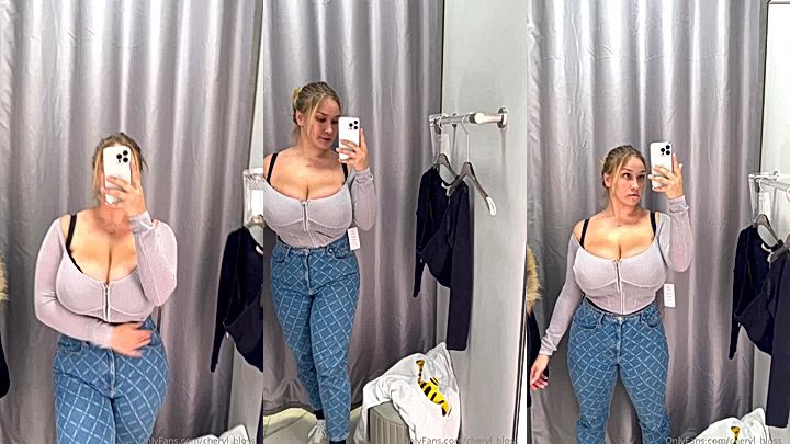 bad freaky white chick Cheryl Blossom runs her hand all over her hot body in front of the mirror