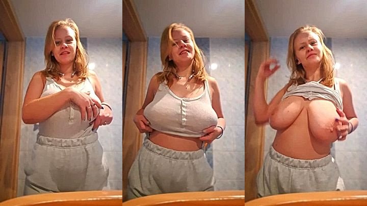 model PolaRainbow shows her big tits in this video, she is so horny she rubs her nipples till they got hard