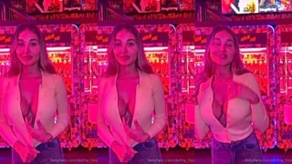 onlyfansmodel Elizabeth Definy flashes her busty tits in the club